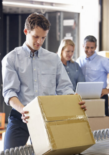 People packing up boxes